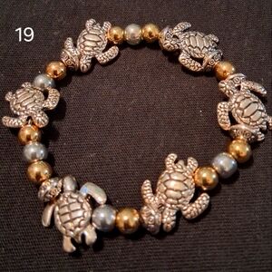 Silver and Gold Turtle Charm Bracelet